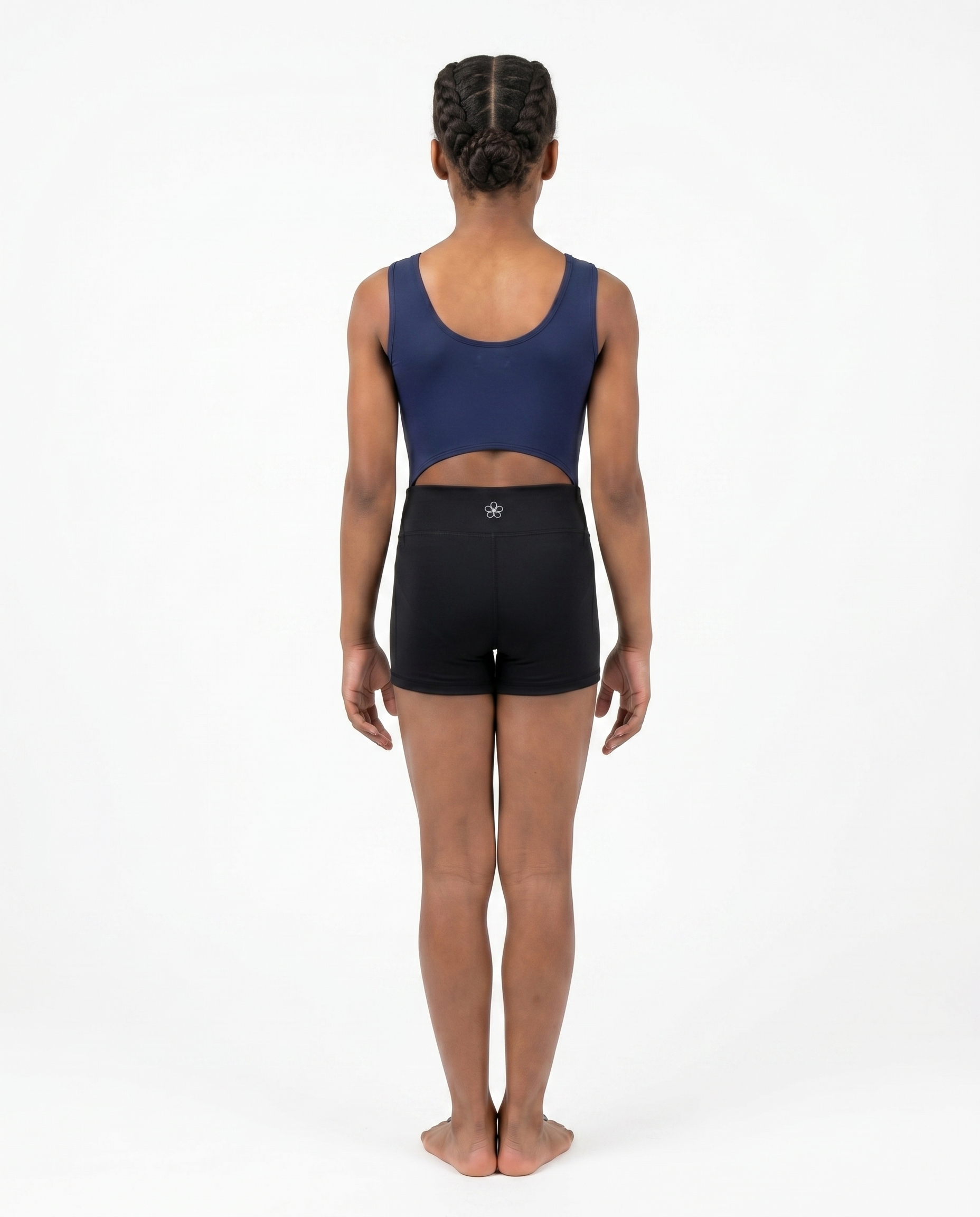 Back view of open back gymnastics bodysuit (leotard) with black gymnastics shorts